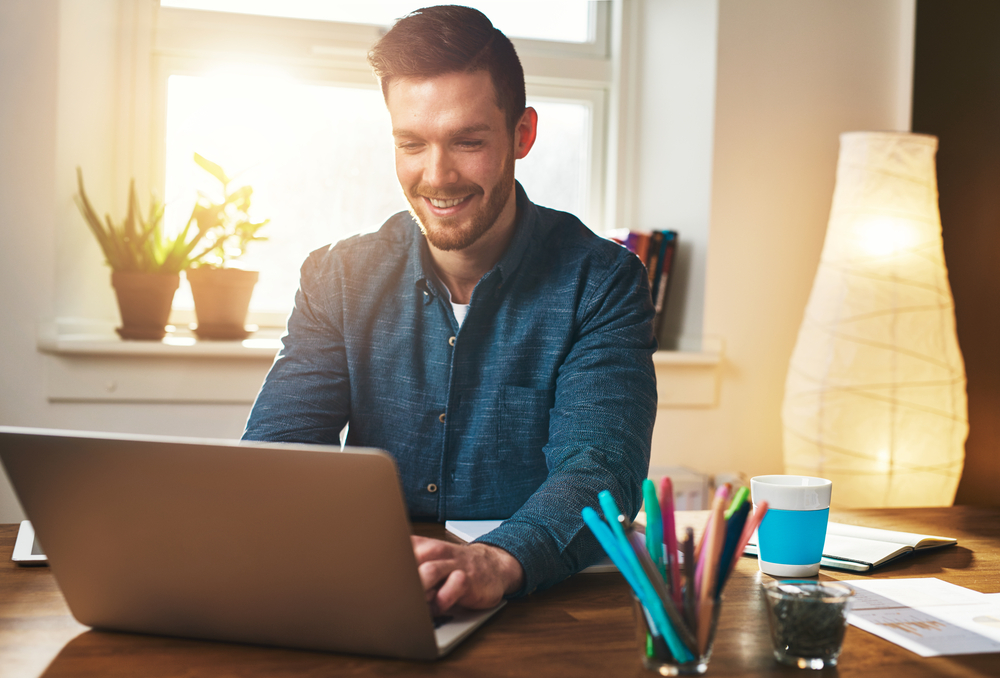 Successful,Entrepreneur,Smiling,In,Satisfaction,As,He,Checks,Information,On woman beside window panel